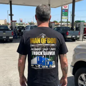 Man of God Christian Truck Driver Dad Papa T-Shirt 10 Man wearing Christian truck driver t-shirt in casual setting.