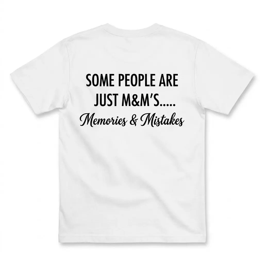 Memories And Mistakes Funny Quote T-Shirt 1 Back flat lay of a white t-shirt featuring the funny sarcastic quote Some People Are Just M&M's Memories and Mistakes in black typography.
