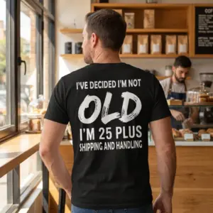 Not Old 25 Plus Shipping and Handling T-Shirt 11 Close-up back view of a man wearing this humorous birthday t-shirt, highlighting the white graphic text on a black background.