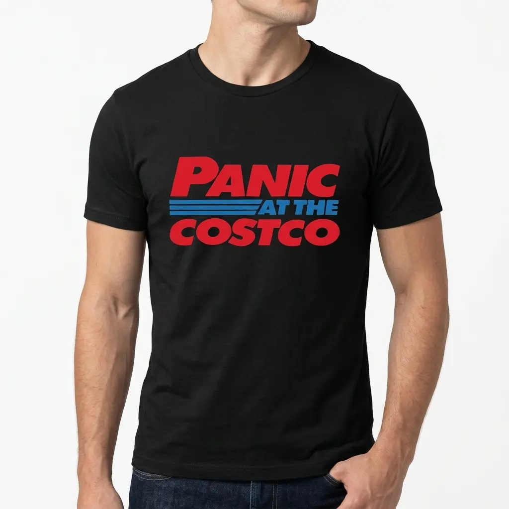 Black t-shirt displaying 'Panic At The Costco' in bold colors.