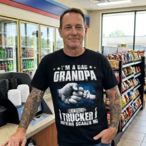 Proud Dad Grandpa Trucker Fist Bump T-Shirt 11 Blue-collar man wearing the "I'M A DAD GRANDPA AND A TRUCKER" t-shirt, emphasizing family pride and confidence.