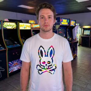 Retro Colorful Camo Bunny Skull T-Shirt 11 Person wearing T-shirt with colorful bunny skull design.