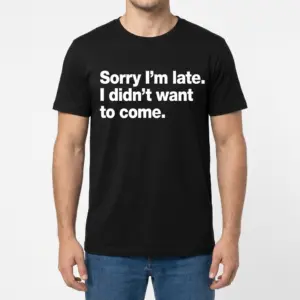 Sorry I'm Late Funny T-Shirt 9 Model wearing a black t-shirt with 'Sorry I'm late. I didn't want to come.' printed in white.