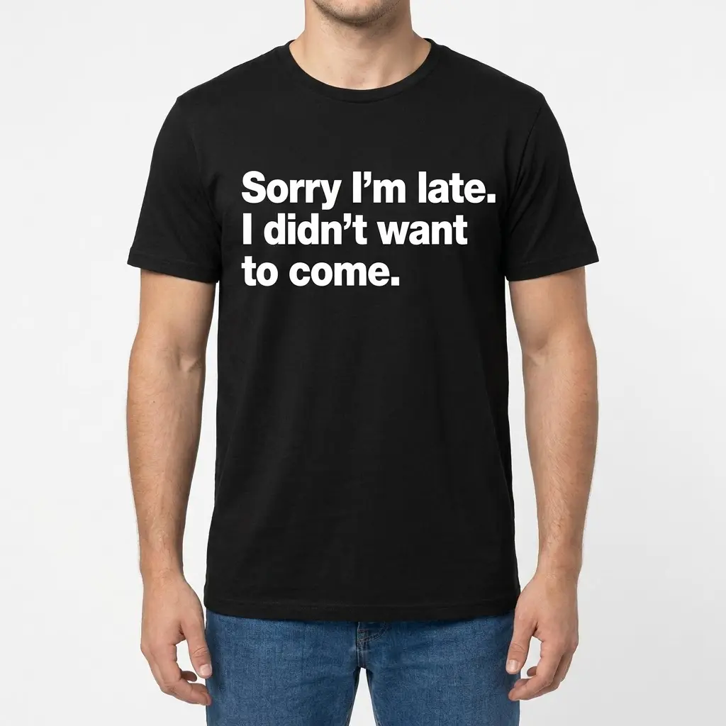 Sorry I'm Late Funny T-Shirt 4 Model wearing a black t-shirt with 'Sorry I'm late. I didn't want to come.' printed in white.