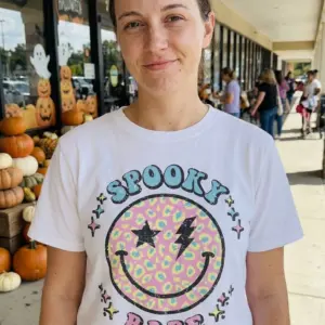 Spooky Babe Halloween T-Shirt 10 Woman wearing Spooky Babe T-Shirt in a casual lifestyle setting.