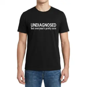 Undiagnosed But Everyone's Pretty Sure T-Shirt 9 Front view of a male model wearing the black t-shirt printed with Undiagnosed but everyone's pretty sure.