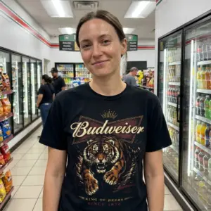 Vintage Budweiser Tiger King of Beers T-Shirt 11 This black tee features a retro beer-inspired charging tiger graphic, with "Budweiser King of Beers" text for a cheeky vibe.
