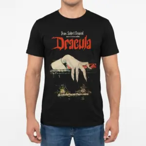 Vintage Dracula Gothic Horror T-Shirt 9 Man modeling a Gothic Dracula t-shirt with a vintage design inspired by classic literature.