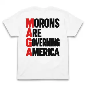 Back flat lay of a white t-shirt featuring bold text reading Morons Are Governing America with MAGA highlighted in red.