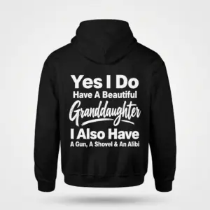 Funny Protective Grandparent Granddaughter T-Shirt 7 Back view flat lay of a black hoodie featuring the humorous protective grandfather granddaughter quote.