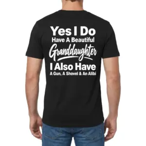 Funny Protective Grandparent Granddaughter T-Shirt 9 Back view of a man wearing the black protective grandparent shirt printed with the humorous granddaughter quote.