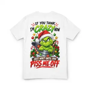 Back flat lay of a white t-shirt featuring a green monster in a trash can with sarcastic Christmas text.