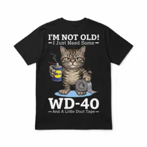 Back flat lay of a black t-shirt featuring a grumpy cat holding WD-40 and duct tape with funny aging text.