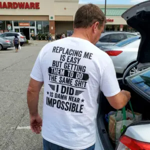 Replacing Me Is Easy Sarcastic Work T-Shirt 11 Casual lifestyle scene featuring the humorous Replacing Me Is Easy shirt design.
