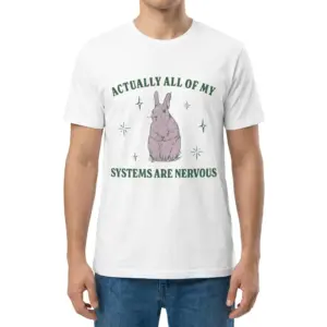 Actually All Of My Systems Are Nervous Bunny T-Shirt 9 Man wearing white graphic tee with white tee front print reading ACTUALLY ALL OF MY SYSTEMS ARE NERVOUS with a wide-eyed pastel bunny
