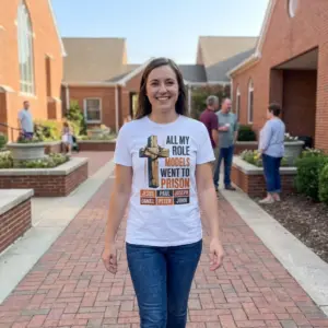 All My Role Models Went To Prison Christian T-Shirt 11 Lifestyle setting showing the Christian Role Models Prison graphic apparel in daily wear.
