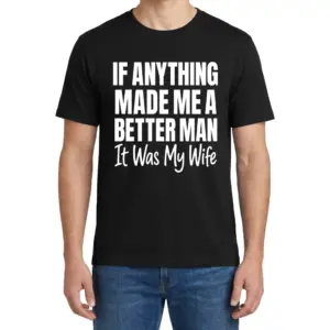 Better Man Because Of My Wife Husband T-Shirt 9 Male model wearing a black Better Man Because Of My Wife t-shirt, front view