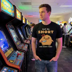 Call Me Short One More Time Angry Duck Knife T-Shirt 11 Lifestyle view highlighting the funny Call Me Short angry duck print on a casual black shirt.