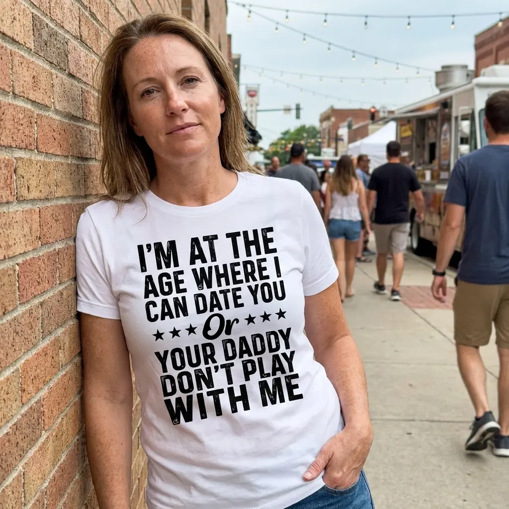Casual lifestyle display featuring the Date You Or Your Daddy humorous typographic shirt in natural lighting.