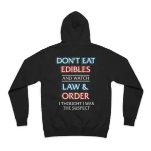 Dont Eat Edibles and Watch Law and Order Funny T-Shirt 7 Black hoodie shown flat from the back featuring the "DON'T EAT EDIBLES AND WATCH LAW & ORDER" design