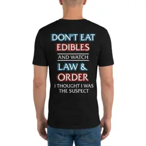 Dont Eat Edibles and Watch Law and Order Funny T-Shirt 9 Man wearing a black T-shirt shown from the back with the "DON'T EAT EDIBLES AND WATCH LAW & ORDER" design