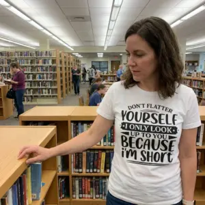 Dont Flatter Yourself Only Look Up To You Im Short T-Shirt 10 Casual lifestyle setting featuring the Don't Flatter Yourself I Only Look Up To You Because I'm Short humorous graphic shirt.