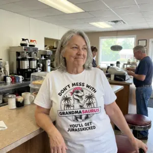 Don't Mess With Grandmasaurus You'll Get Jurasskicked Tee 10 Everyday streetwear outfit styling white shirt with white tee front print reading DONT MESS WITH GRANDMASAURUS YOULL GET JURASSKICKED with a T-Rex wearing