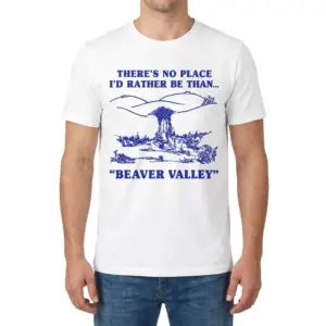 Funny Beaver Valley Retro Graphic T-Shirt 9 Man wearing the Beaver Valley graphic T-shirt, showing the blue landscape illustration and bold lettering on the front