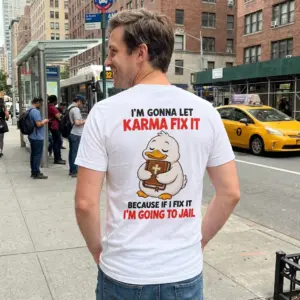 Funny Christian Duck Karma Fix-It T-Shirt 10 Lifestyle view of the funny Christian duck shirt showing the Bible-holding duck and its karma fix-it joke