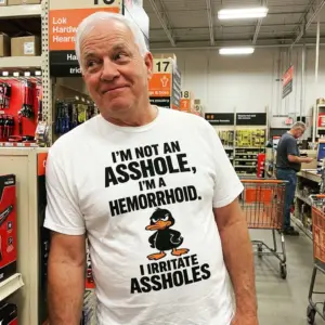 Funny Duck Hemorrhoid Joke Graphic T-Shirt 9 Funny Duck graphic shirt featuring bold hemorrhoid joke text and a cartoon black duck in a lifestyle presentation