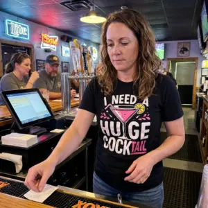 Funny I Need A Huge Cocktail Graphic T-Shirt 10 Lifestyle view highlighting the funny 'I Need A Huge Cocktail' graphic t-shirt in everyday wear.