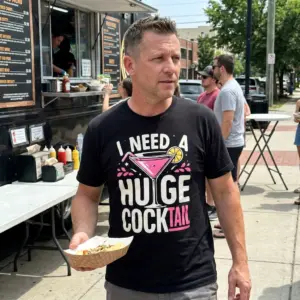 Funny I Need A Huge Cocktail Graphic T-Shirt 11 Lifestyle setting showcasing the humorous 'I Need A Huge Cocktail' graphic apparel.