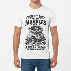 Funny Lost All My Marbles T-Shirt 9 Man wearing the white graphic t-shirt with the funny marbles in a torn bag print.