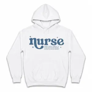 Funny Nurse Rocking It T-Shirt 7 White nurse T-shirt displayed from the front, featuring bold blue lettering and the slogan “Some days I rock it. Some days it rocks me.”