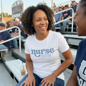 Funny Nurse Rocking It T-Shirt 10 Funny nurse T-shirt featuring blue “nurse” lettering, star accents and a playful rocking-it slogan.