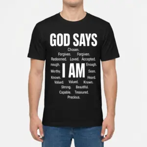 Funny Retired Nurse T-Shirt – Not My Problem Anymore 9 Man wearing a black shirt with white GOD SAYS and I AM affirmation text on the front.