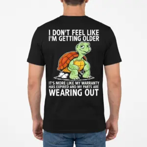 Funny Turtle Warranty Expired Getting Older T-Shirt 9 Back view of a man wearing the black t-shirt printed with the funny turtle and warranty expired quote.