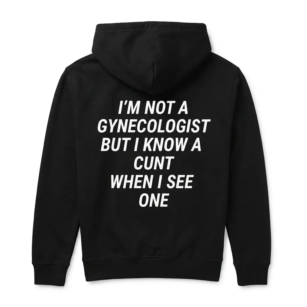 Cozy pullover hoodie displaying black tee back print reading IM NOT A GYNECOLOGIST BUT I KNOW A CUNT WHEN I SEE ONE in white block text