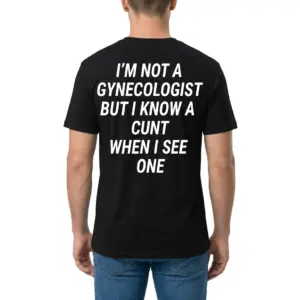 I'm Not A Gynecologist But I Know A Cunt When I See One Tee 9 Man wearing black graphic tee with black tee back print reading IM NOT A GYNECOLOGIST BUT I KNOW A CUNT WHEN I SEE ONE in white block text