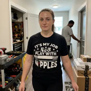 Its My Job to Play With Nipples Funny Plumber T-Shirt 11 Casual lifestyle scene showcasing the humorous play with nipples plumber graphic apparel.