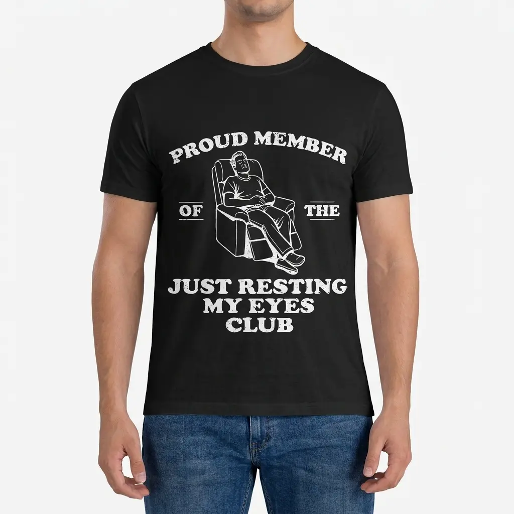 Front view of a man wearing the Just Resting My Eyes Club graphic t-shirt.