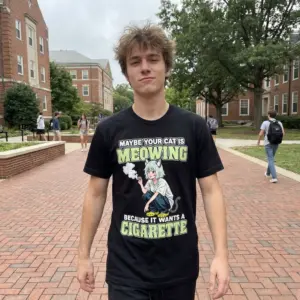 Maybe Your Cat Is Meowing For A Cigarette Anime T-Shirt 11 Close-up casual look showcasing black tee and black tee front print reading MAYBE YOUR CAT IS MEOWING BECAUSE IT WANTS A CIGARETTE with an anime cat girl
