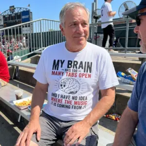 My Brain Has Too Many Tabs Open T-Shirt 11 Casual lifestyle view featuring the My Brain Has Too Many Tabs Open shirt in everyday wear.