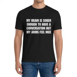 My Brain Is Sober Enough But My Arms Feel Nice T-Shirt 9 Man wearing black graphic tee with black tee front print reading MY BRAIN IS SOBER ENOUGH TO HAVE A CONVERSATION BUT MY ARMS FEEL NICE in white block text