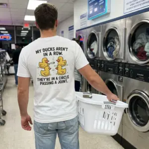 My Ducks Aren't In A Row Funny T-Shirt 10 Lifestyle view showcasing the back of the funny duck weed t-shirt in everyday wear.