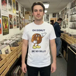 Oh Donut Be So Silly Funny Retro Cartoon Donut T-Shirt 11 Casual lifestyle view featuring the retro cartoon donut graphic with text Oh Donut Be So Silly.