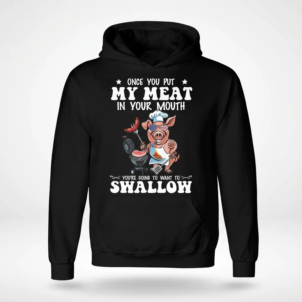 Once You Put My Meat In Your Mouth BBQ Chef T-Shirt 2 Black hoodie flat lay with a graphic of a pig chef grilling and funny BBQ meat quote printed on the front.