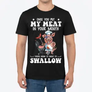 Once You Put My Meat In Your Mouth BBQ Chef T-Shirt 9 A man wearing the black t-shirt with a funny pig chef BBQ graphic print on the front.