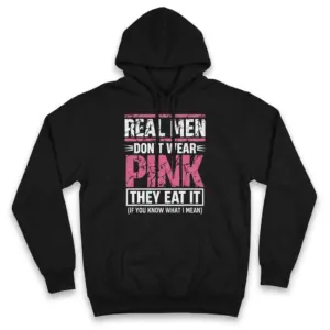 Real Men Don't Wear Pink They Eat It Funny T-Shirt 7 Front flatlay of a hoodie featuring the humorous Real Men Don't Wear Pink design in cracked white and pink typography.