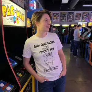 Say One More Joke About My Height T-Shirt 11 Casual lifestyle scene featuring the humorous height joke apparel in everyday wear.